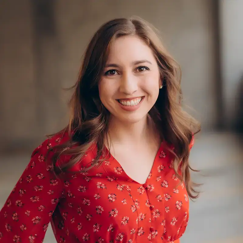 Skilled speech therapist smiling, providing speech therapy solutions in Montana, helping clients improve communication skills.